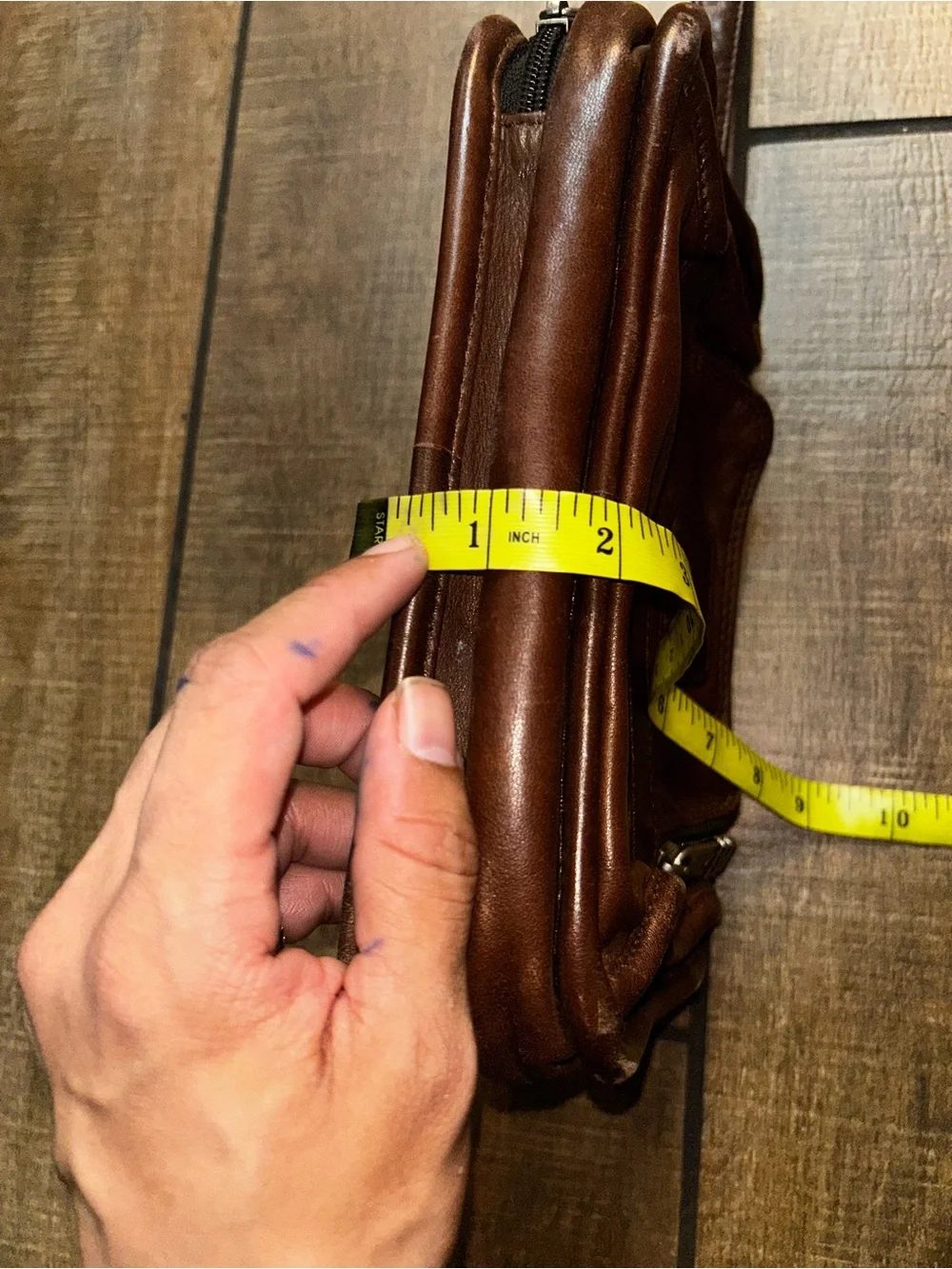 TUMI brown leather travel bag